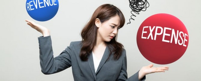 Image description depicts a woman balancing business decisions. Courtesy of IStock